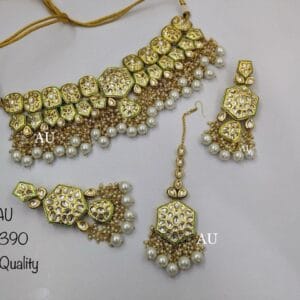 Celina Kundan Set In White And Golden